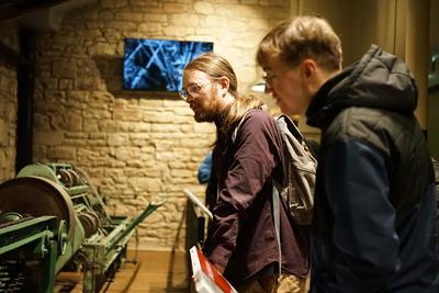 Delegates look at old Jute making machinery