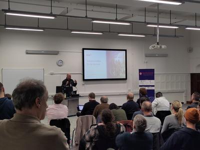 A lightning talk in the 'Way' room. Photo by Gregory Marler