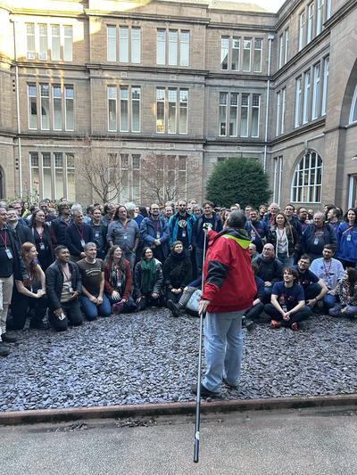 Behind the scenes of the group photo.