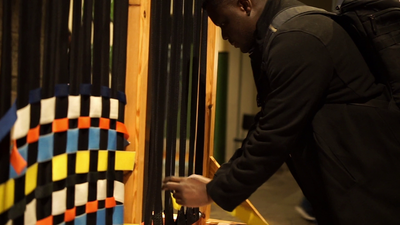 An interactive weaving display in the museum